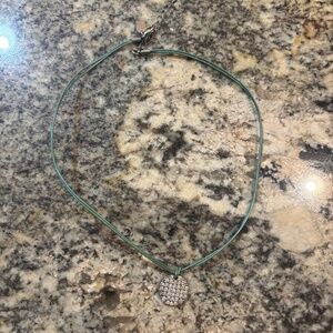 Green necklace with silver pendant